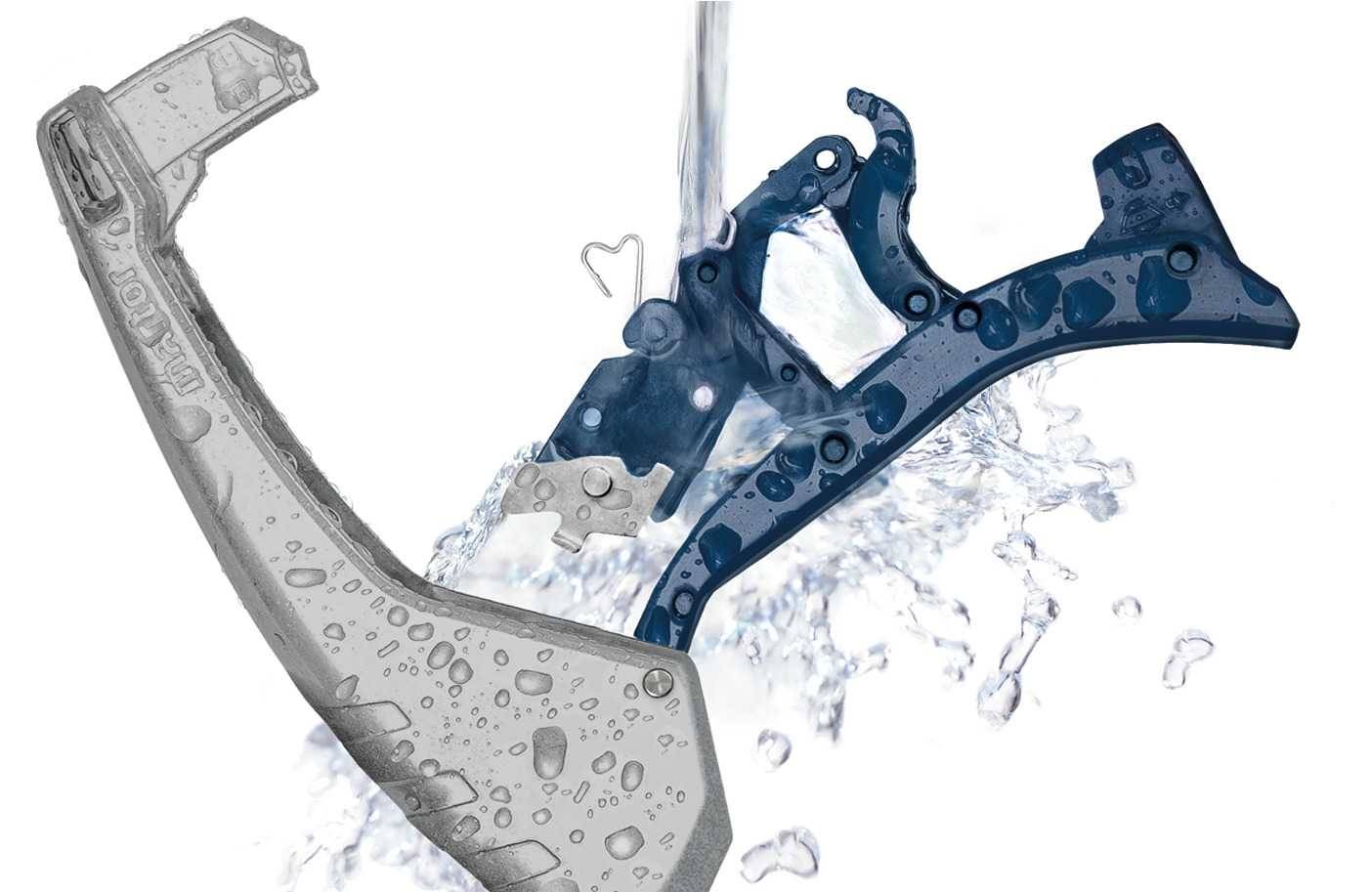 A transparent and a blue plastic item are doused with water, possibly depicted as a cleaning process.