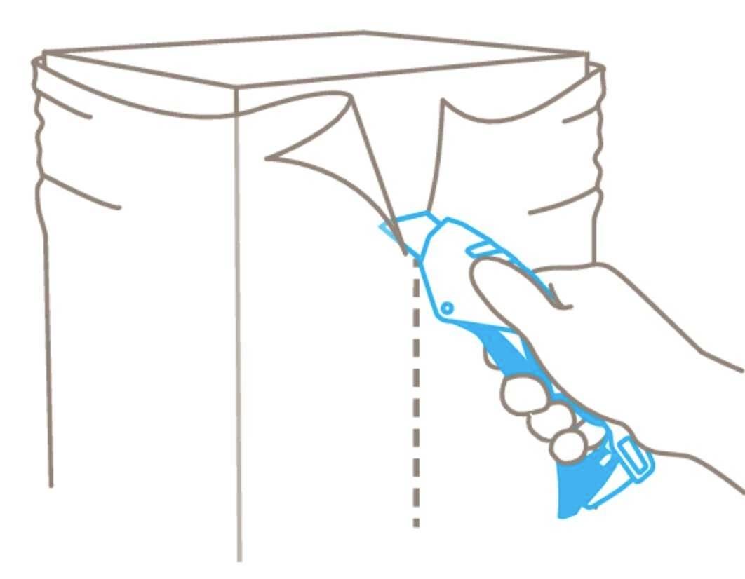 A hand is holding a cutting tool that opens the top edge of a cardboard box. The dotted line indicates the cutting line.