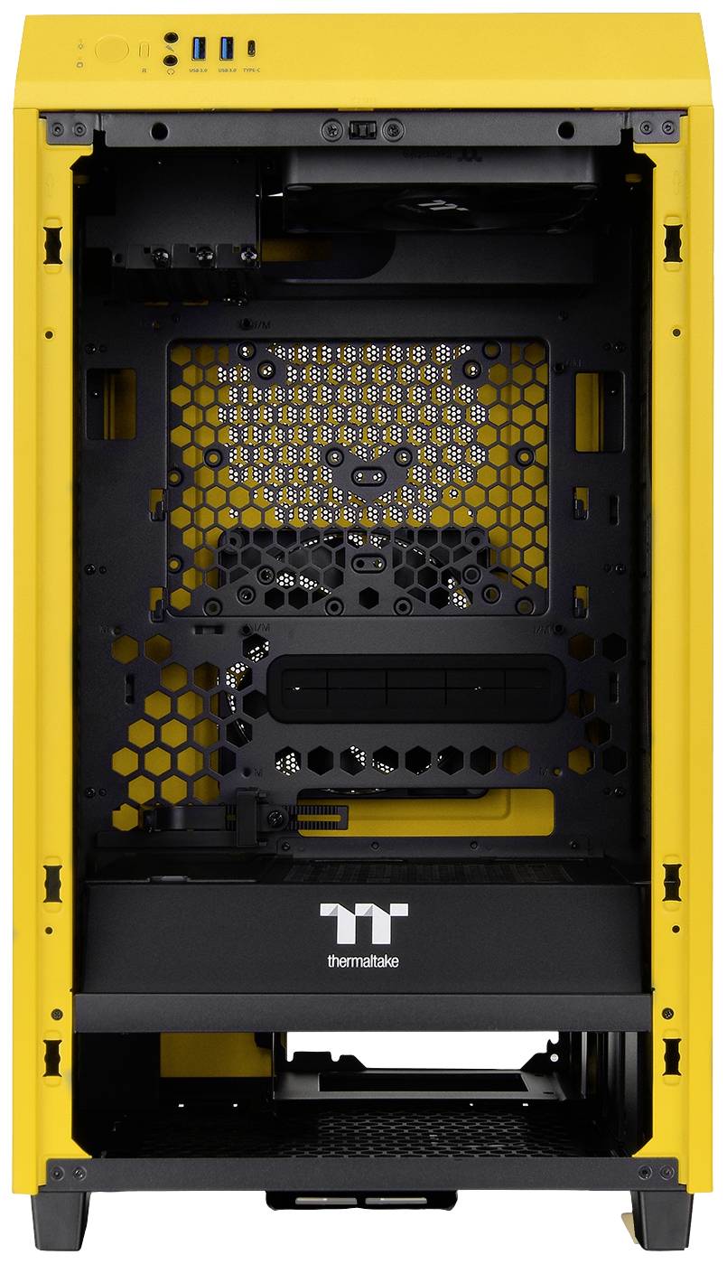 Yellow computer case viewed from the front without hardware. Two USB ports and audio jacks at the top. Interior shows space for components.