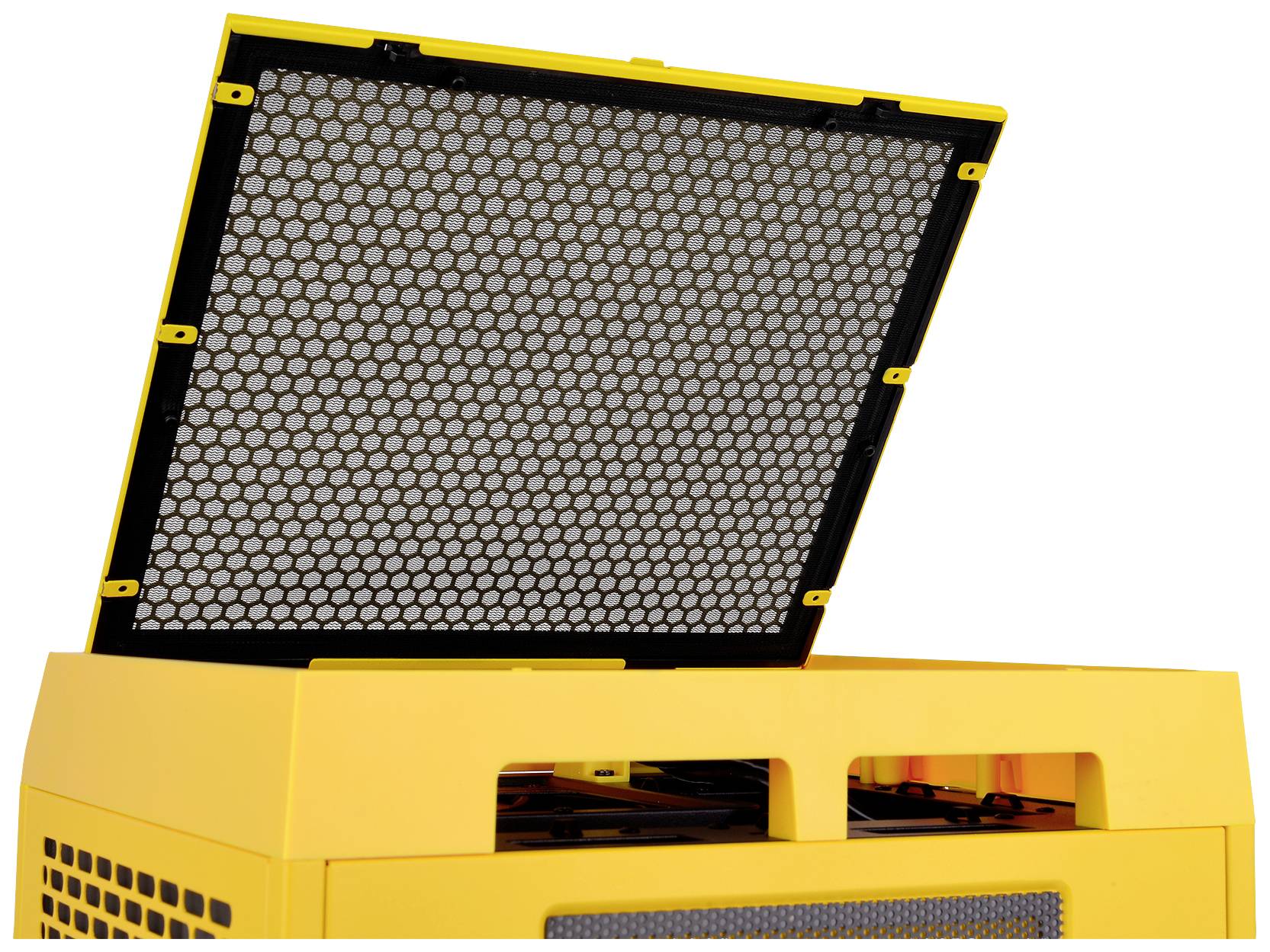 A yellow box with an open lid and black grating. Could be a machine or a technical device.
