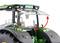 A green tractor with a flipped-up window on the windscreen. A red arrow points to the movable part.