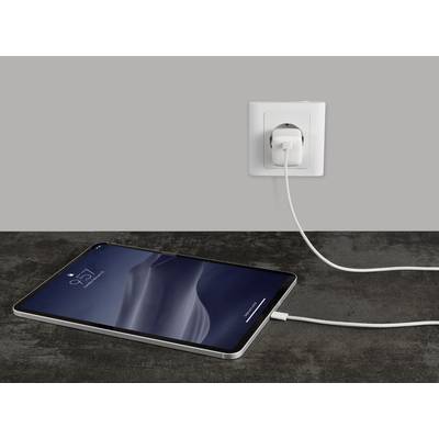 Tablet is plugged into a power socket and charging. Screen displays the time as 9:41.