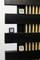 Three digital thermometers on a wooden and metal wall each show 26°C and a humidity of 39%.