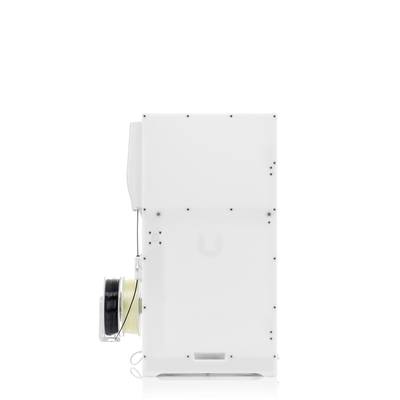 3D printer with filament compartment, side view. The device is closed, shows no signs of operation, and is positioned on a white surface.