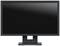 A black computer monitor with a black screen bezel on a rectangular stand, switched off.