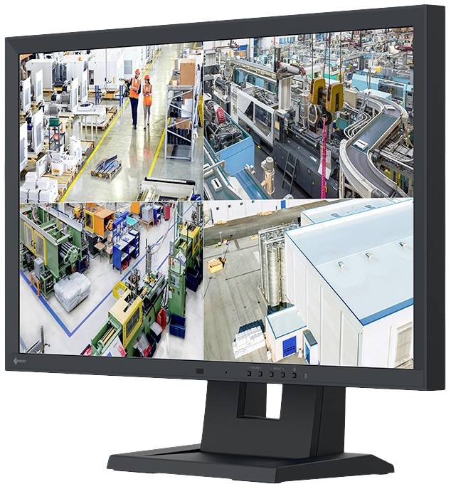 A screen displays multiple factory views: workers are inspecting machines, conveyor belts are transporting goods, production facilities.