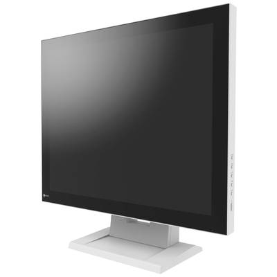 A modern computer monitor with a black screen and silver frame stands at an angle in a minimalist office design.