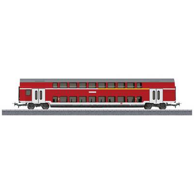 A red double-decker train carriage on railway tracks. The carriage has multiple rows of windows and two doors.