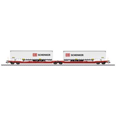 Two white DB Schenker containers on a goods wagon on railway tracks.
