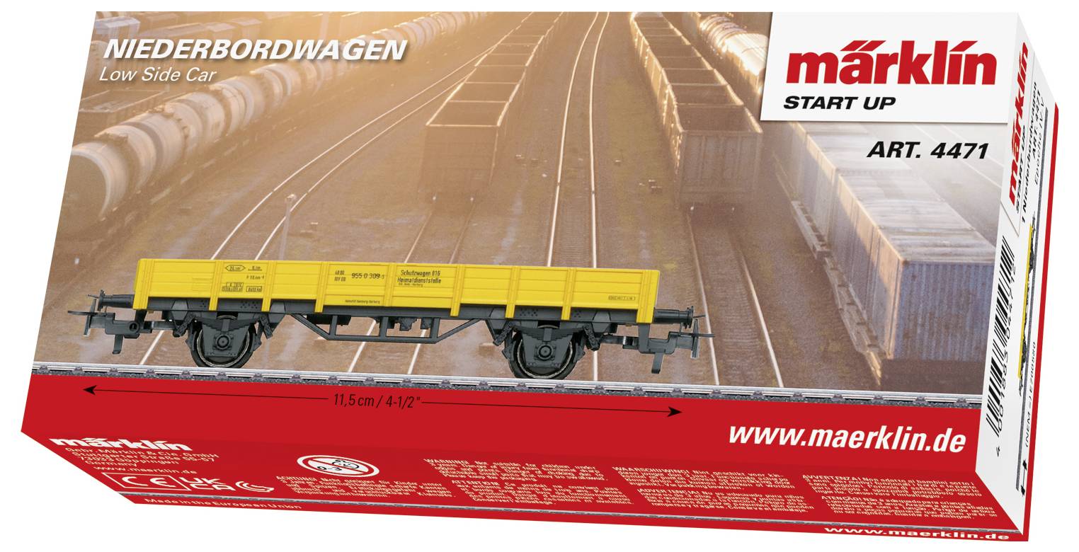 'Packaging of a Märklin low-sided wagon, item no. 4471, with yellow wagon model, surrounded by a goods train station motif.'