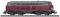 A red model locomotive sits on railway tracks. It has a distinctive streamlined shape and belongs to the Deutsche Bahn vehicle type.