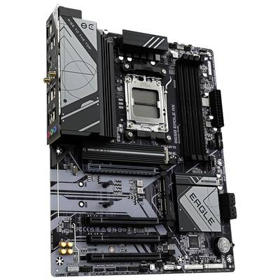 A black computer motherboard with multiple slots and connectors, including four RAM slots and several PCIe slots.