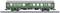 Green and silver model train carriage of the Deutsche Bundesbahn on railway tracks. Side view with detailed windows and doors.