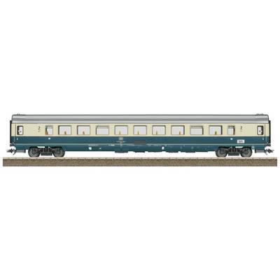 A blue and beige second-class train carriage stands on railway tracks, with a side view showing multiple windows and doors.