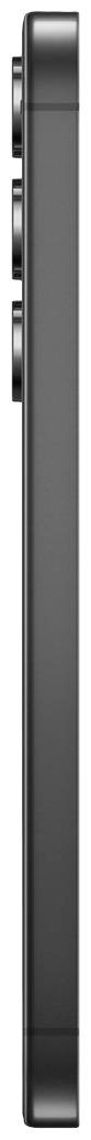 Side view of a smartphone with three rounded camera lenses in the top left corner. The casing is black and angular.