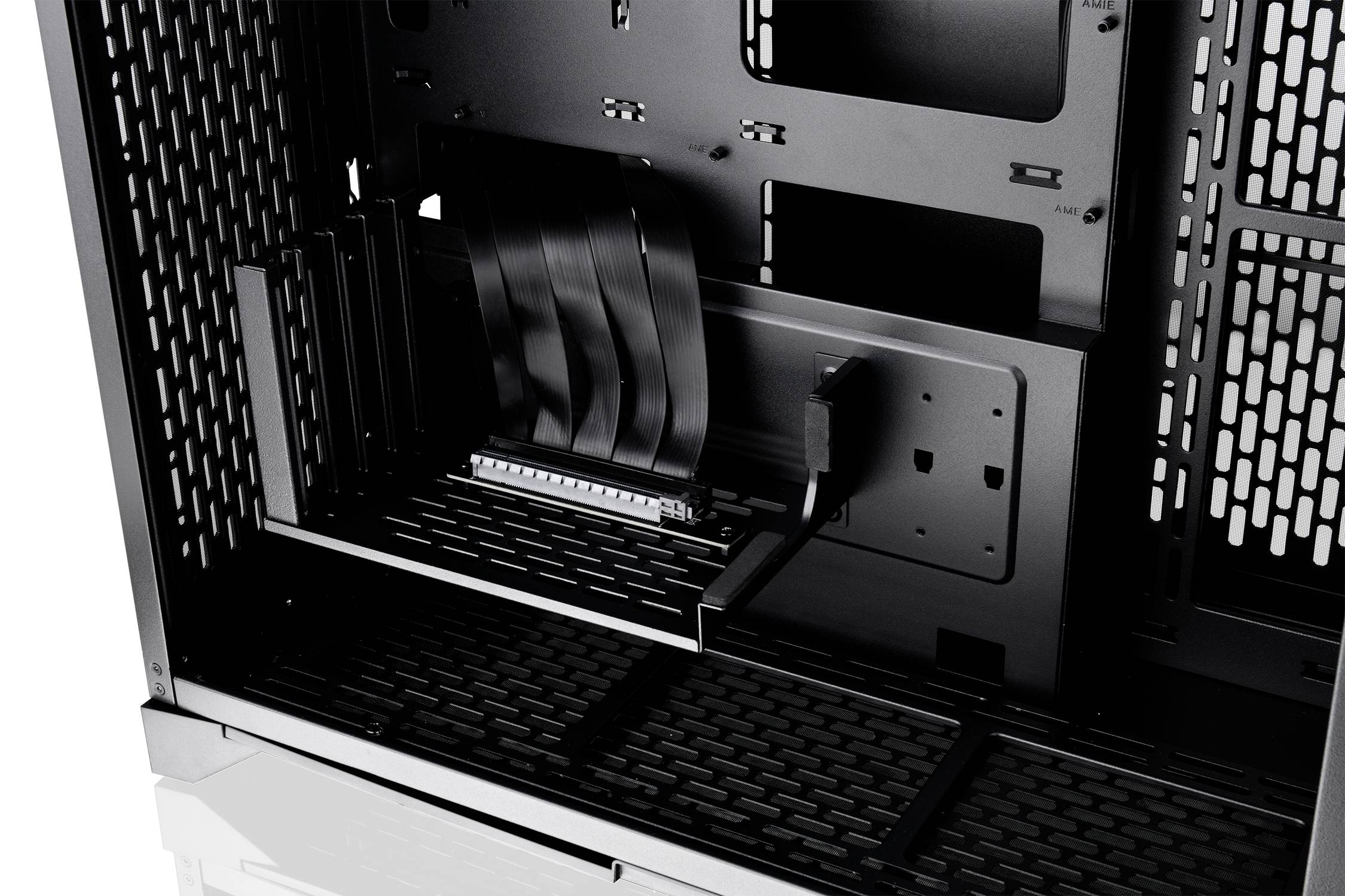 Empty computer case with side cable management system, open expansion slots, and black interior for custom PC build.