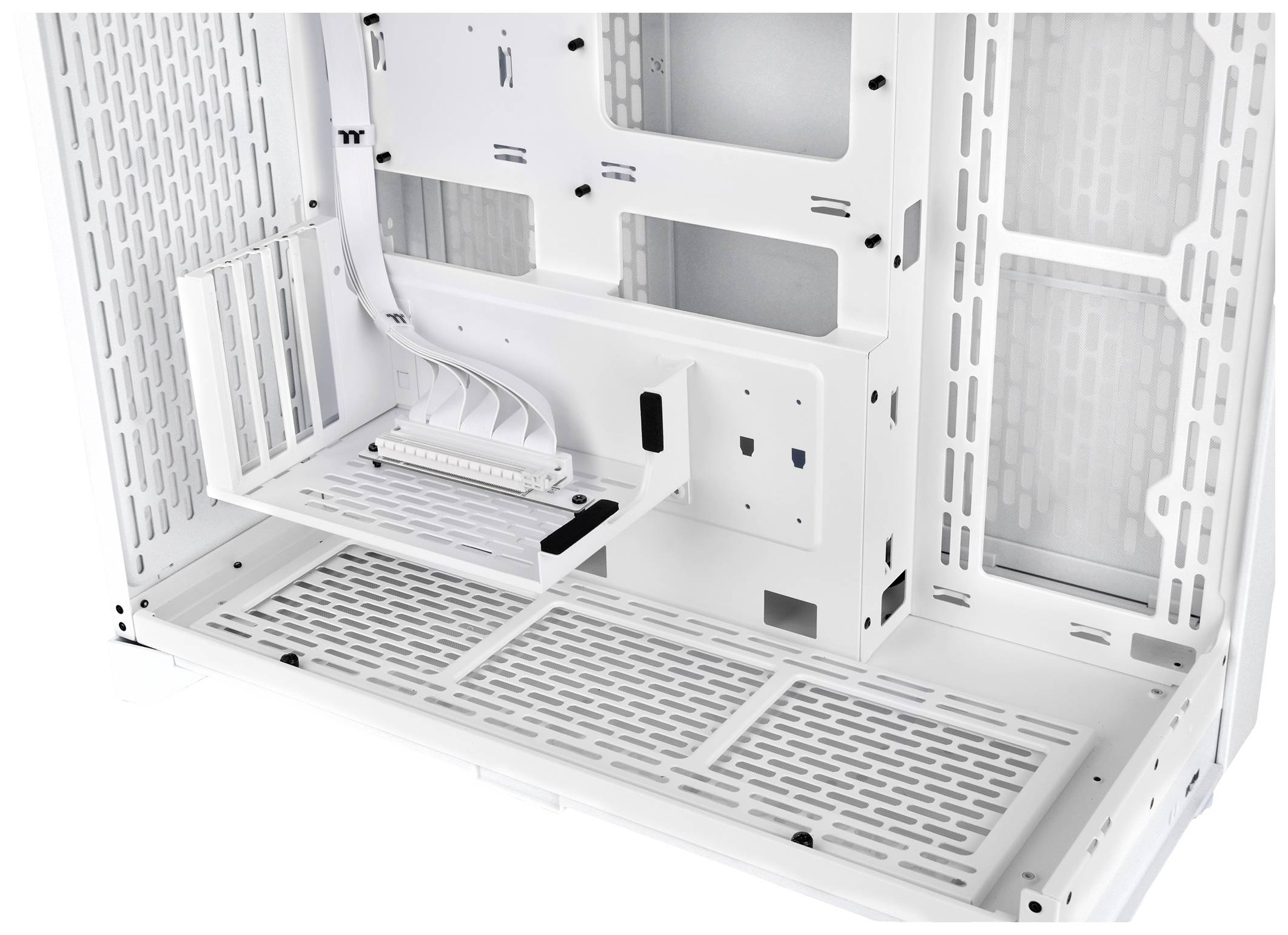 White computer case interior without components. Visible are mounting brackets for the motherboard and graphics card, along with cable management slots.