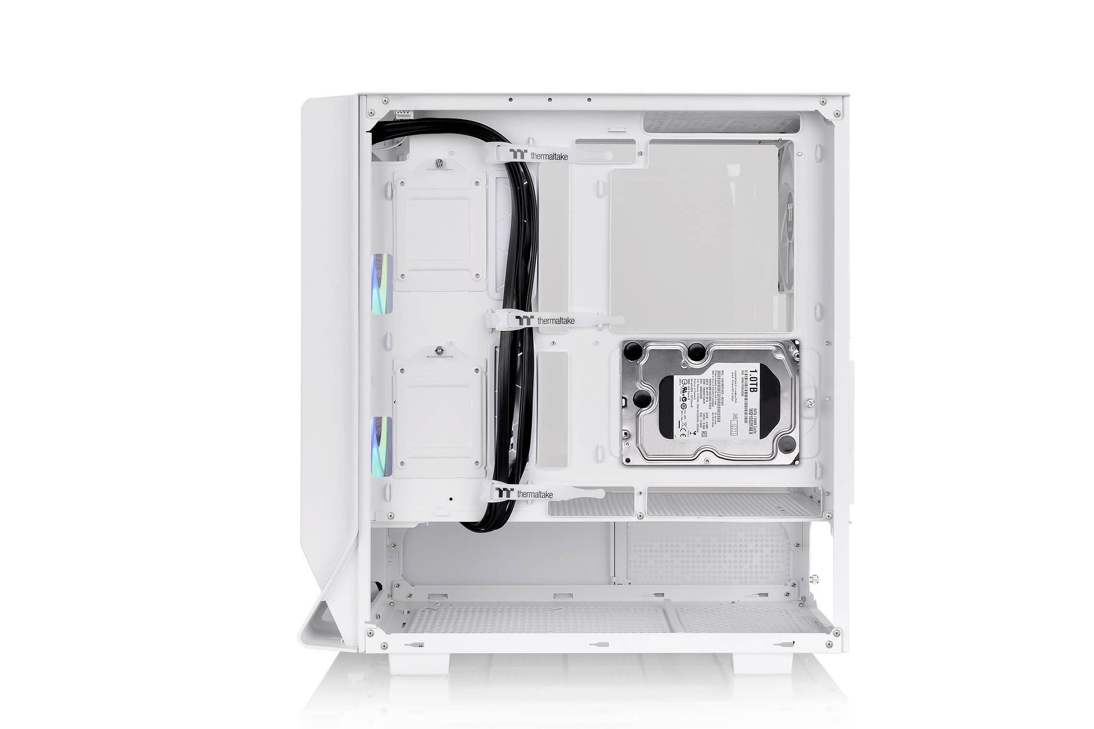 A white, open computer case reveals its internal structure with a hard drive bay and cable management. No components are installed.
