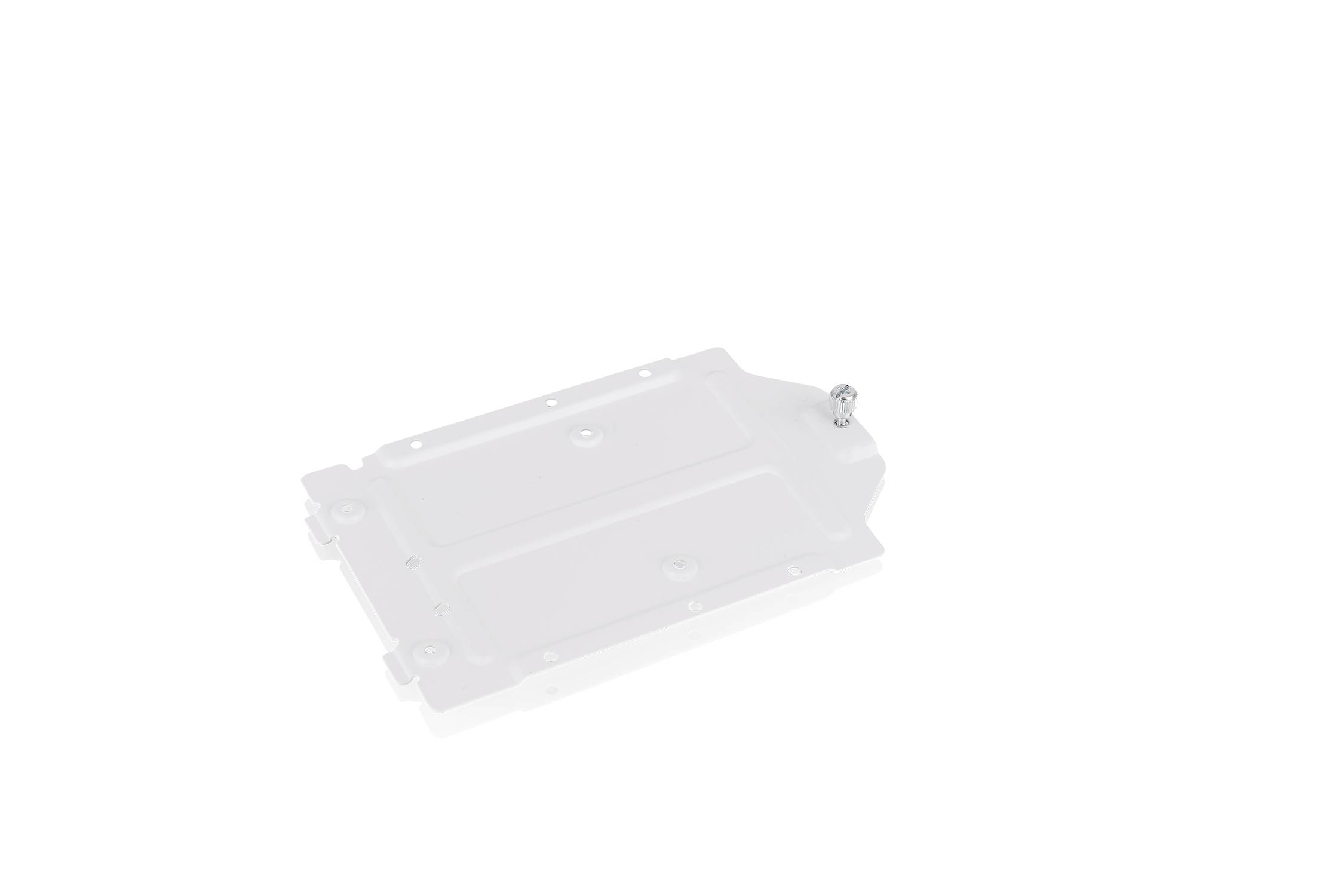 A white plastic casing with a visible screw hole and screw on a white surface.