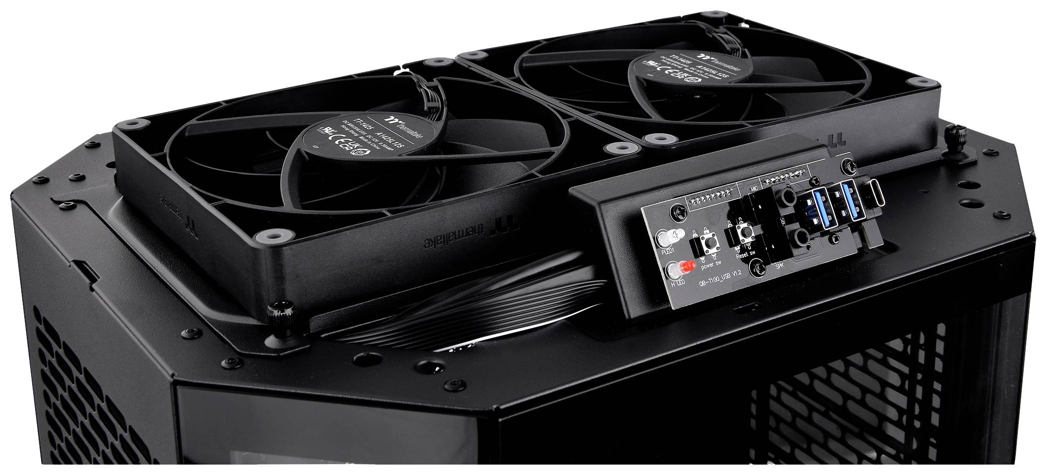 Black and grey computer case with two fans on top and multiple ports on the front, including USB ports.