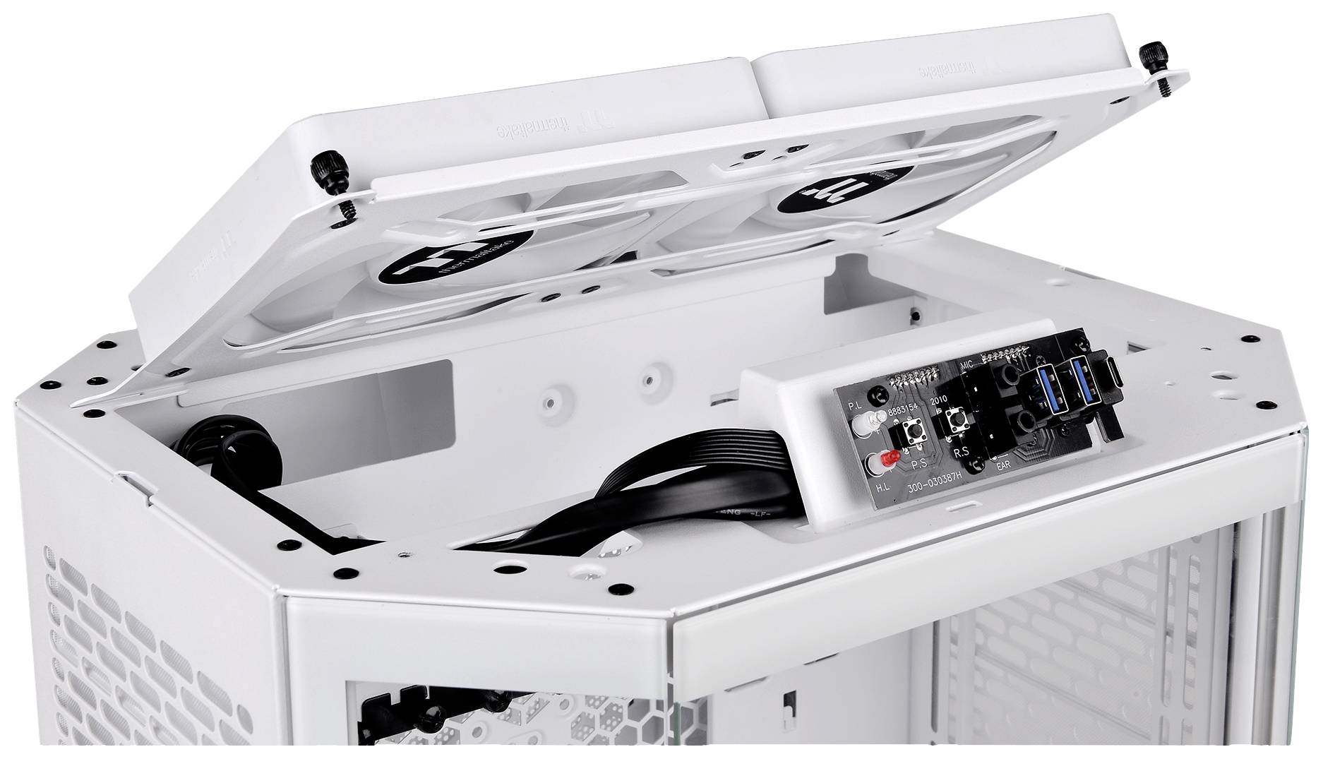 Opened computer case, showing the interior with fans and connections. White case with two fans on the top.