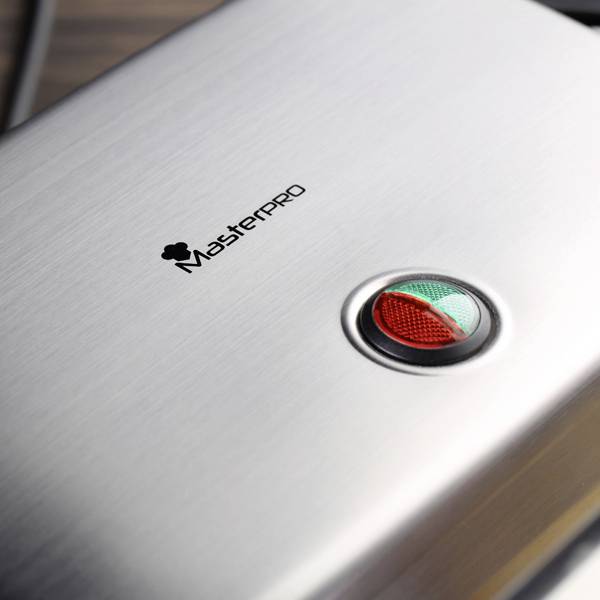 A stainless steel device by "MasterPro" with an illuminated red and green symbol, potentially a status indicator, on its top surface.