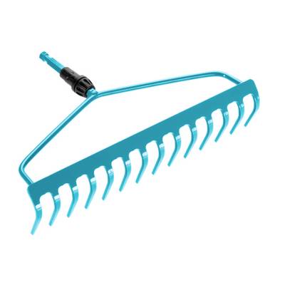A turquoise plastic rake with black elements, suitable for raking leaves in the garden.