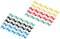 A colourful row of small plastic clips in various colours: Yellow, Red, Black, Green, Blue. Neatly arranged in rows.