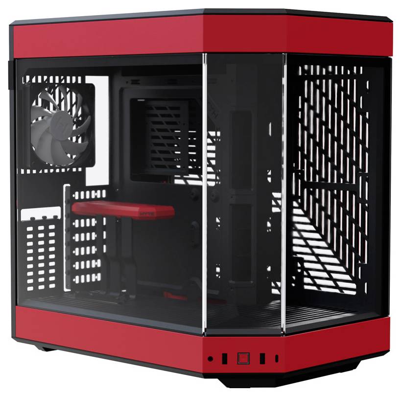 Red computer case cube with transparent glass on the front, visible fan on the left and open mounting area inside.