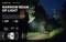 'Torch illuminates narrow street; range 363 m, 1400 lumens. Bright spot in front of pedestrian. Structure and functions described.'
