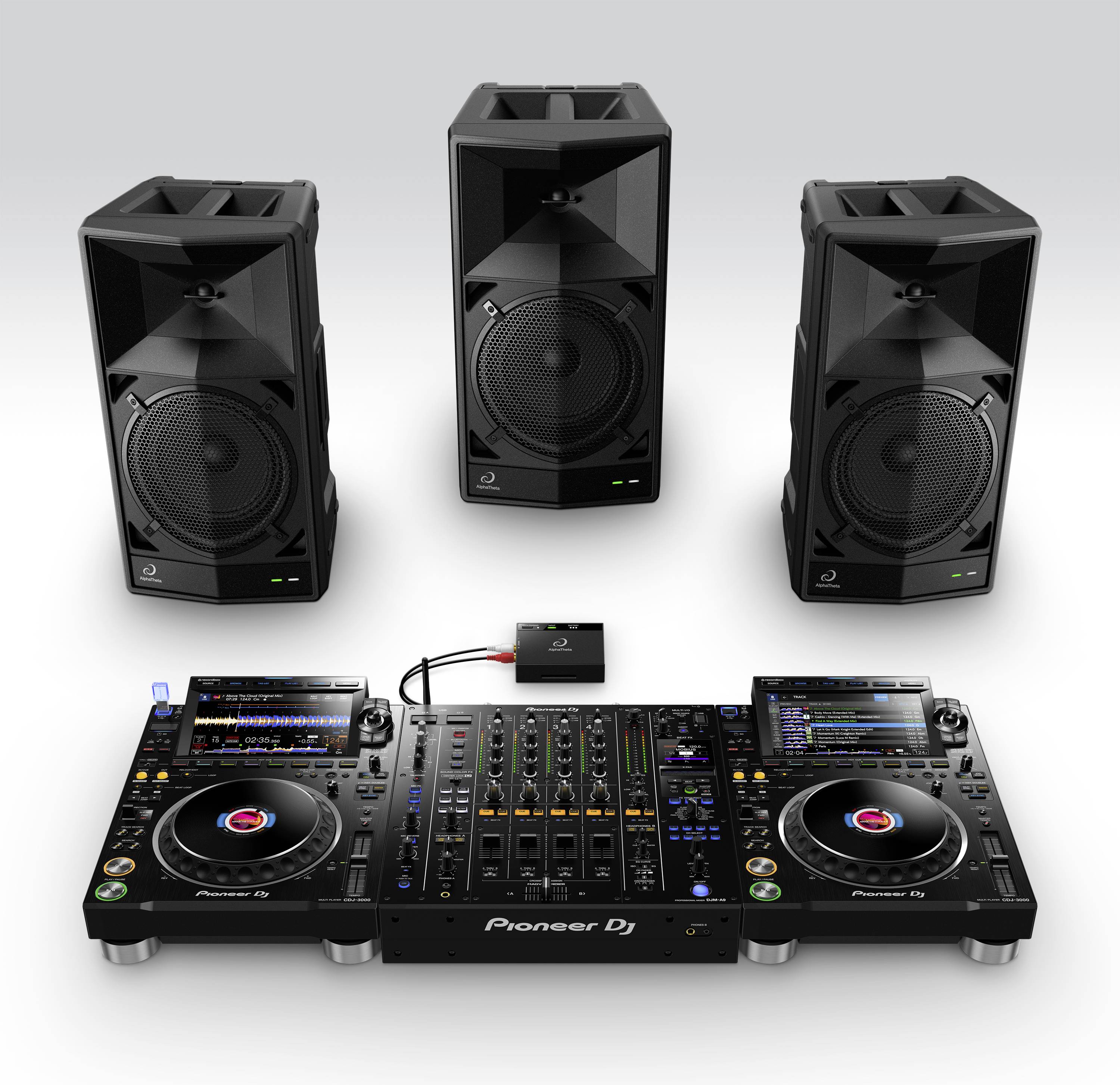 'DJ set with mixing desk, two turntables and three speakers, all from Pioneer DJ. Suitable for professional audio applications.'