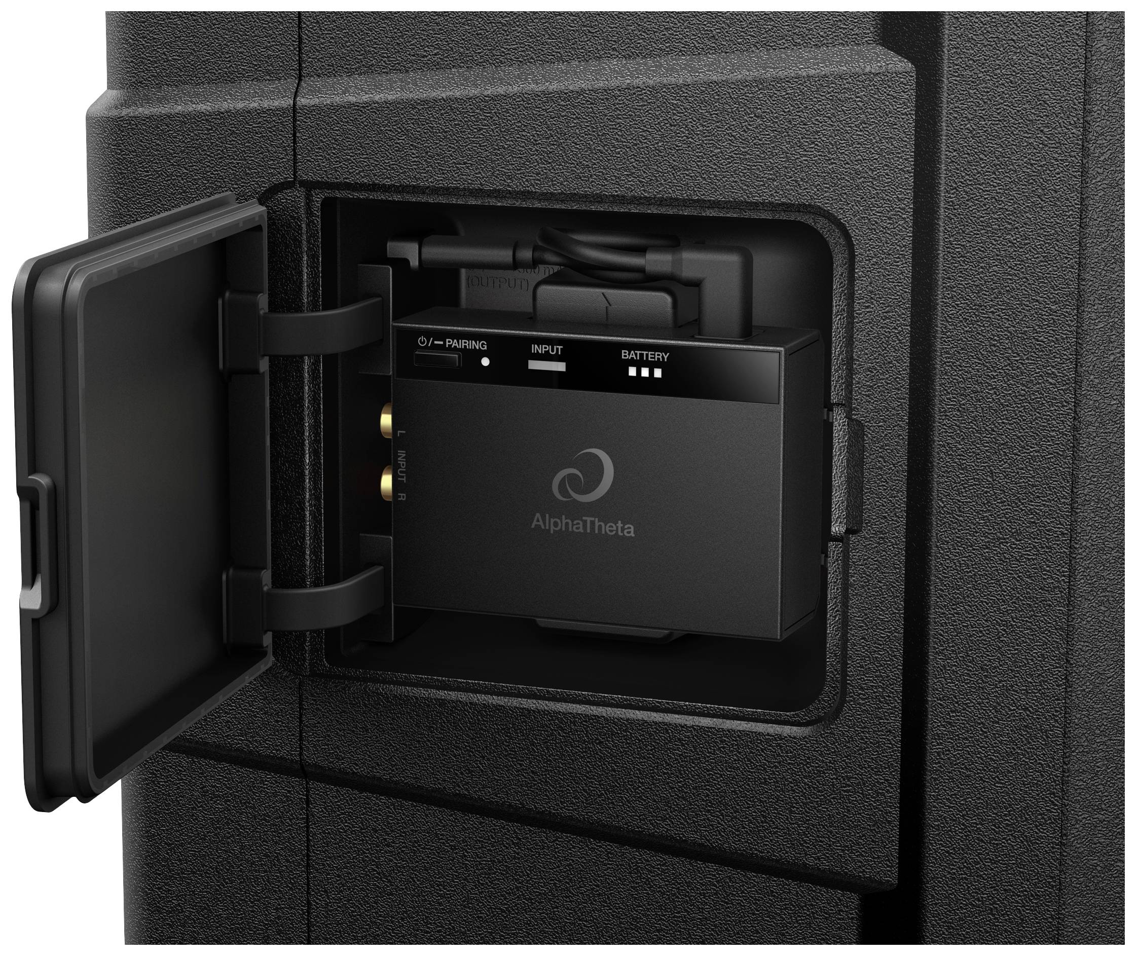 Open cover of a speaker reveals the controls and connections of the integrated system with the inscription 'AlphaTheta'.