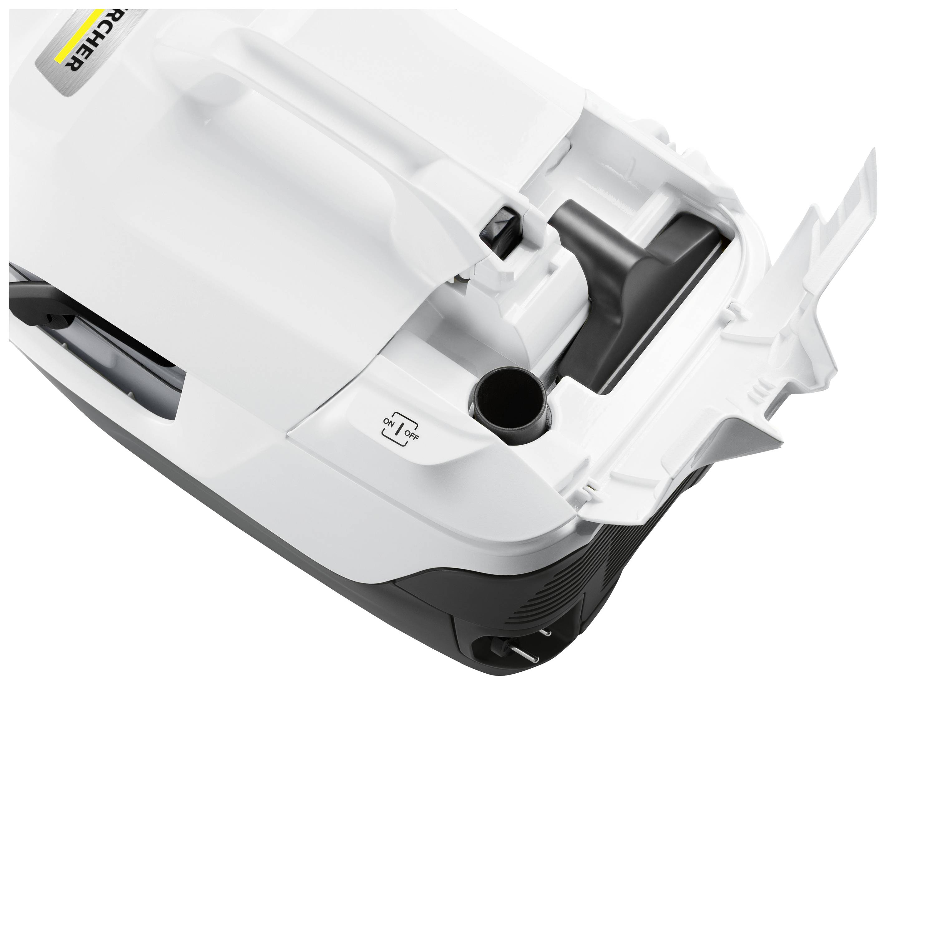 A white vacuum cleaner with an open flap revealing the dust container. A small, black compartment is visible.