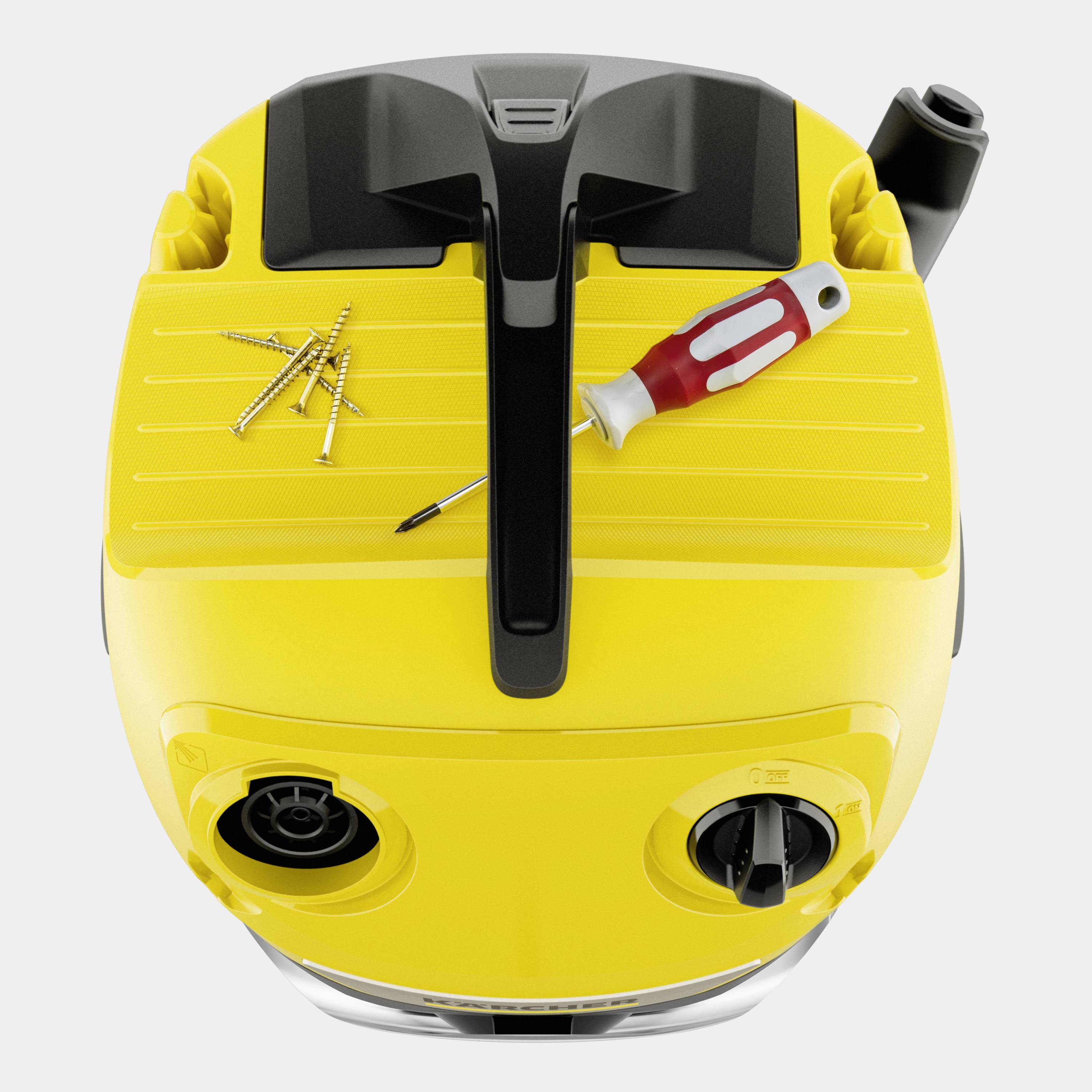 Yellow vacuum cleaner from above, with a screwdriver and several screws on top.