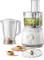 Kitchen food processor with multiple attachments, including a blender and grater, filled with finely chopped vegetables on a white background.