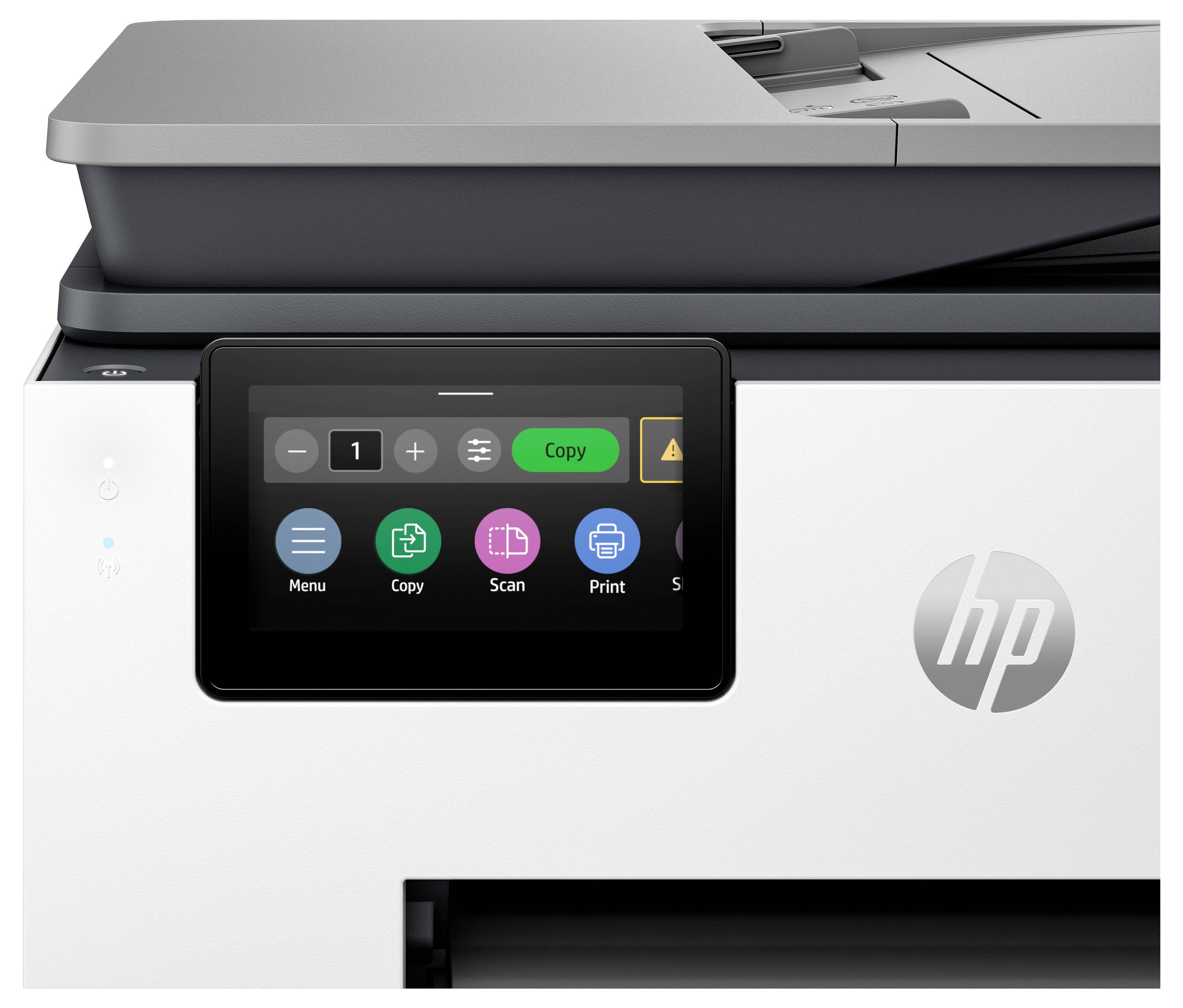 Front view of an HP multifunction printer with a touchscreen showing copy, scan, and print options.