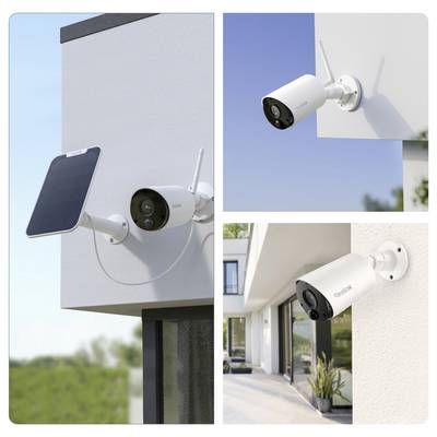 Outdoor home security cameras are mounted on building walls, one with a solar panel attached, showcasing surveillance setups.