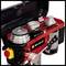A red and black Einhell drill stand with drive belts, silver discs and control elements, lid open.