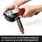 The hand holds an angle grinder with a disc guard, text underneath: 'Disc guard with quick adjustment for adaptation to any working position'.