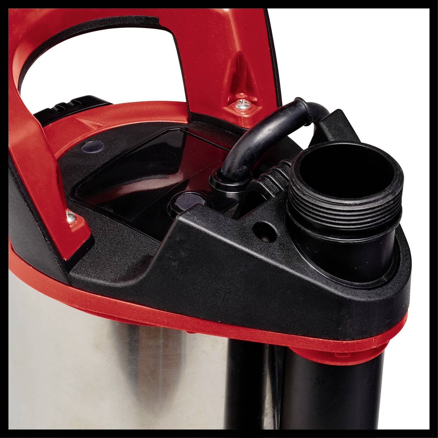 A red and black water pump with an open connection and a handle, ready for use in drainage work.