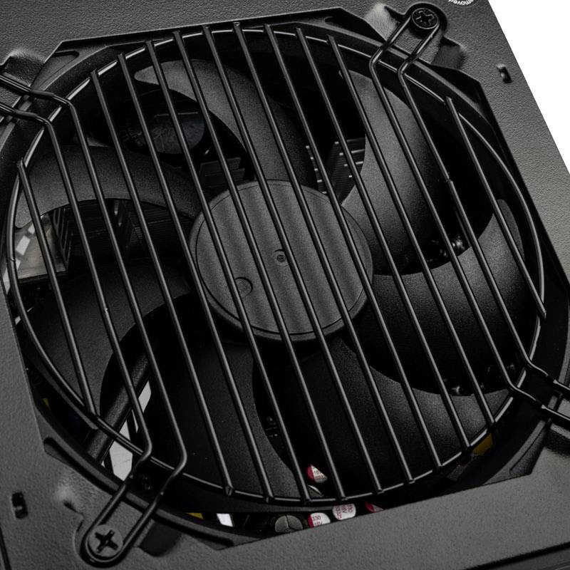 A black computer fan with a protective grille that shields the fan blades. The fan is part of a technical device.