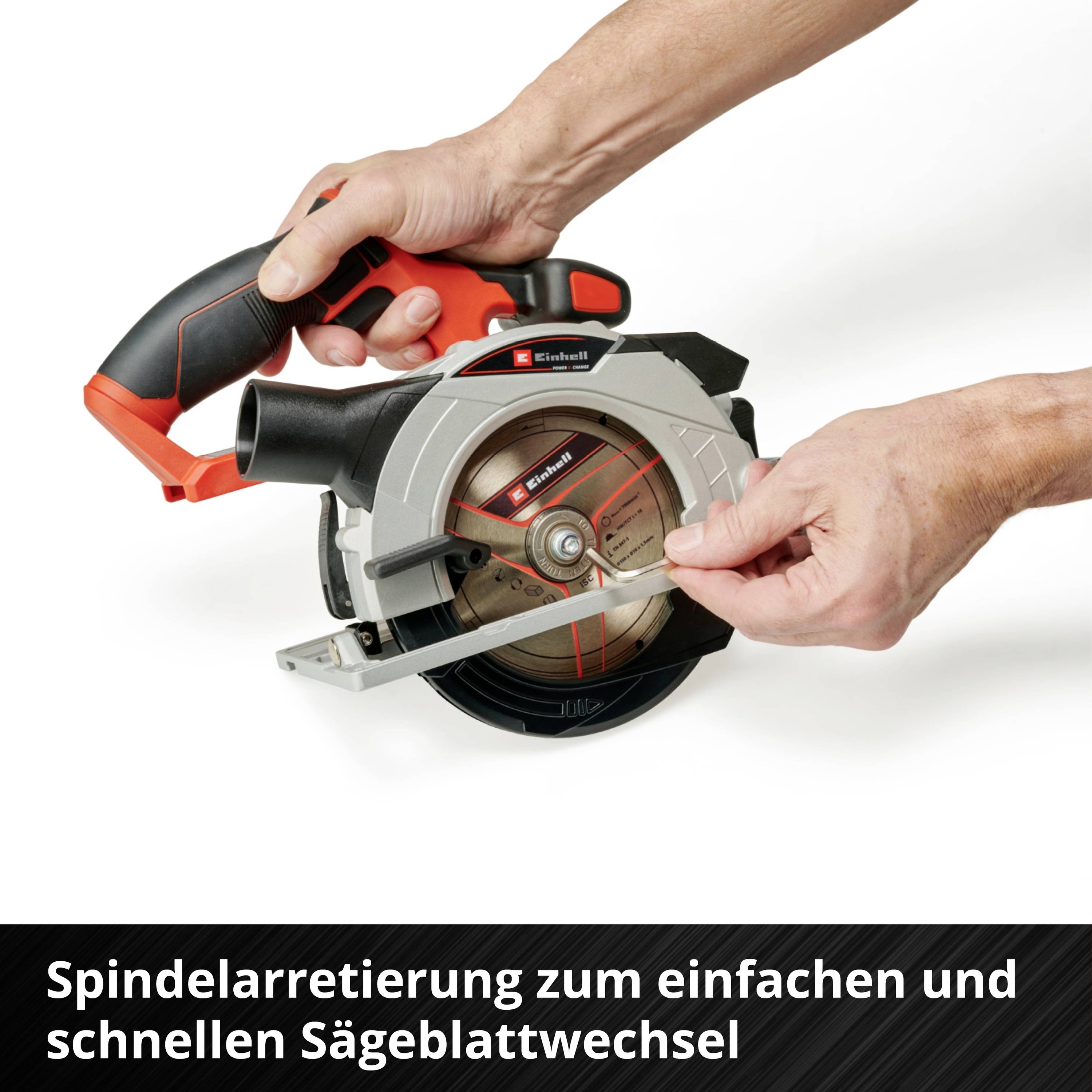 A hand adjusts the spindle lock on a circular saw to allow easy and quick blade changing.