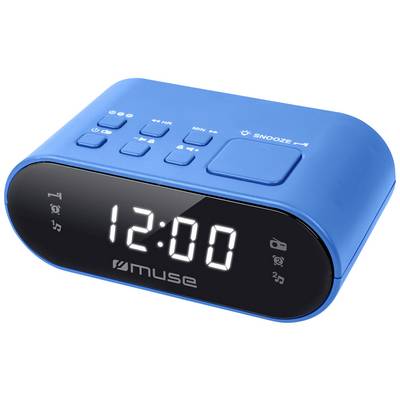 A blue digital alarm clock displays the time as 12:00. Above are buttons for controlling the alarm and radio.