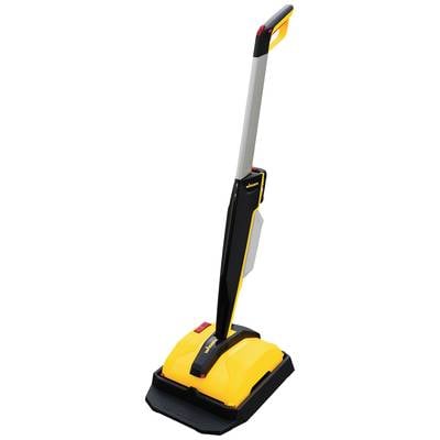 A yellow and black floor cleaner with a long handle, standing on a charging station.