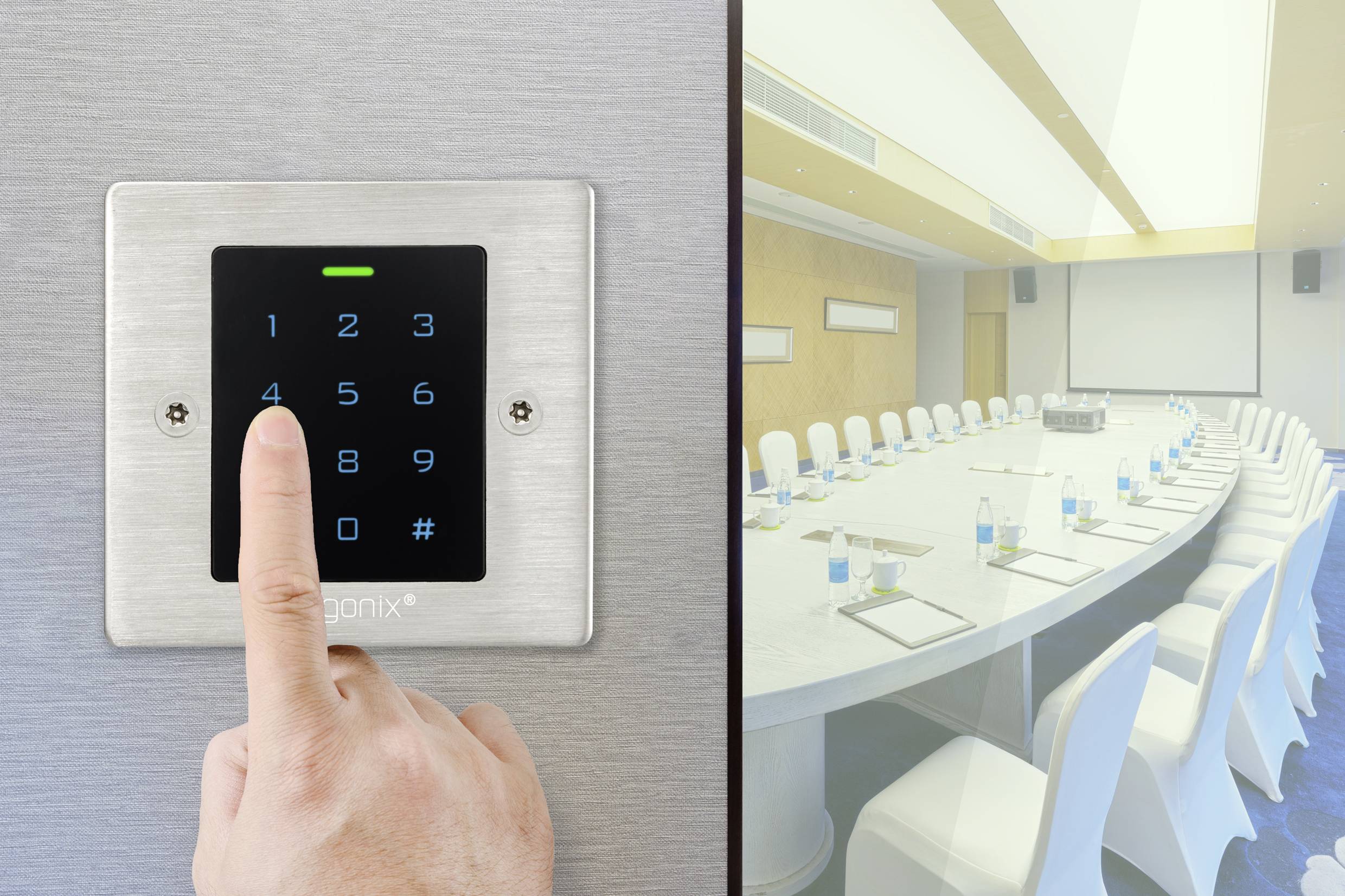 A finger taps on a number lock in front of a conference room with an oval table, surrounded by white chairs.