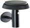 Outdoor wall light with a round, flat lampshade and motion sensor. Wall-mounted. Modern, black design for exterior areas.