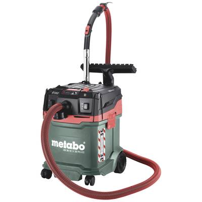 Industrial vacuum cleaner with a red hose and green body, Metabo brand. Fitted with multiple wheels for easy mobility.