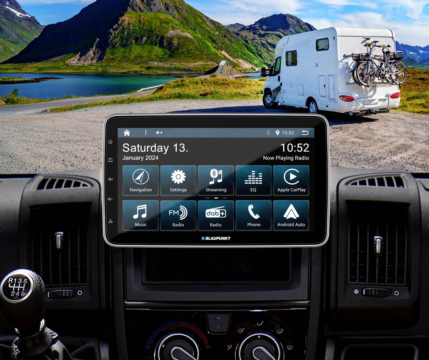 A campervan is parked by a lake in a mountainous landscape. In the foreground, a navigation screen displays the date 13th January 2024.
