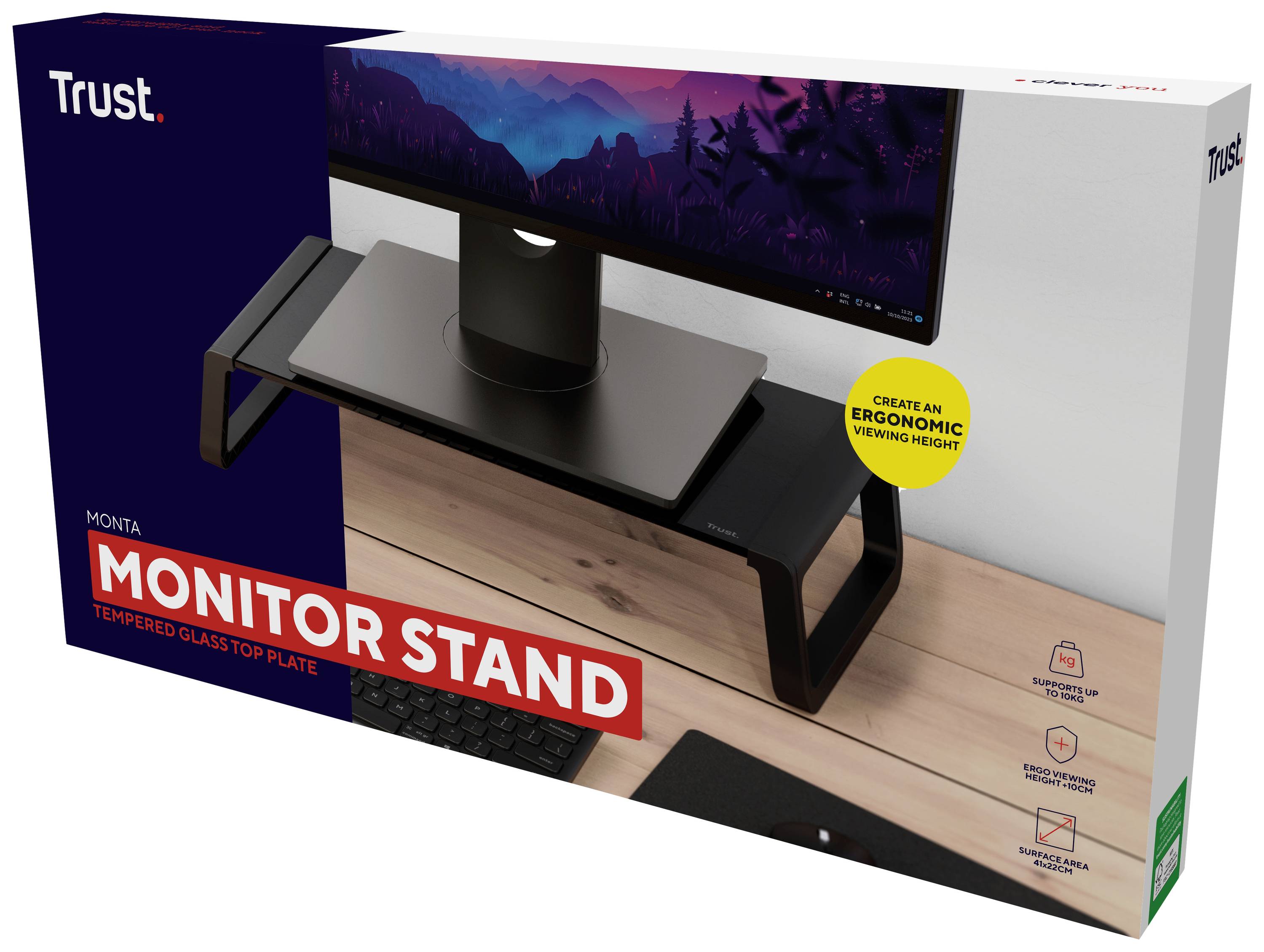 The packaging displays a glass monitor stand with a black frame. Slogan: 'Create an ergonomic viewing height'.