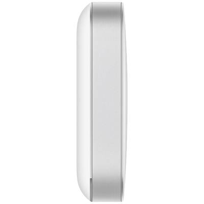 The image shows the side view of a slim, white electronic device with rounded edges.
